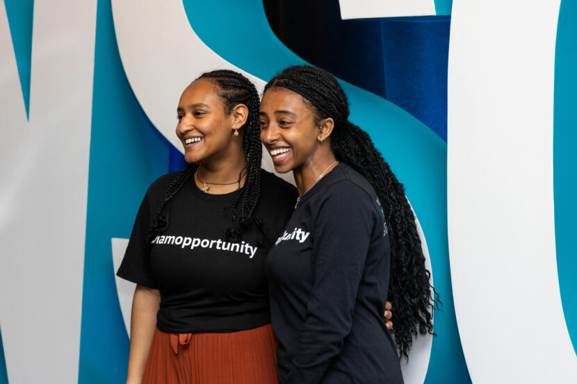 Two scholars posing for a photo at OpportunityTalks