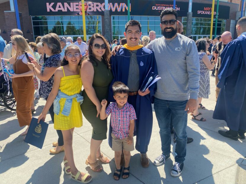 Christian Montes Vela and family at their graduation ceremony