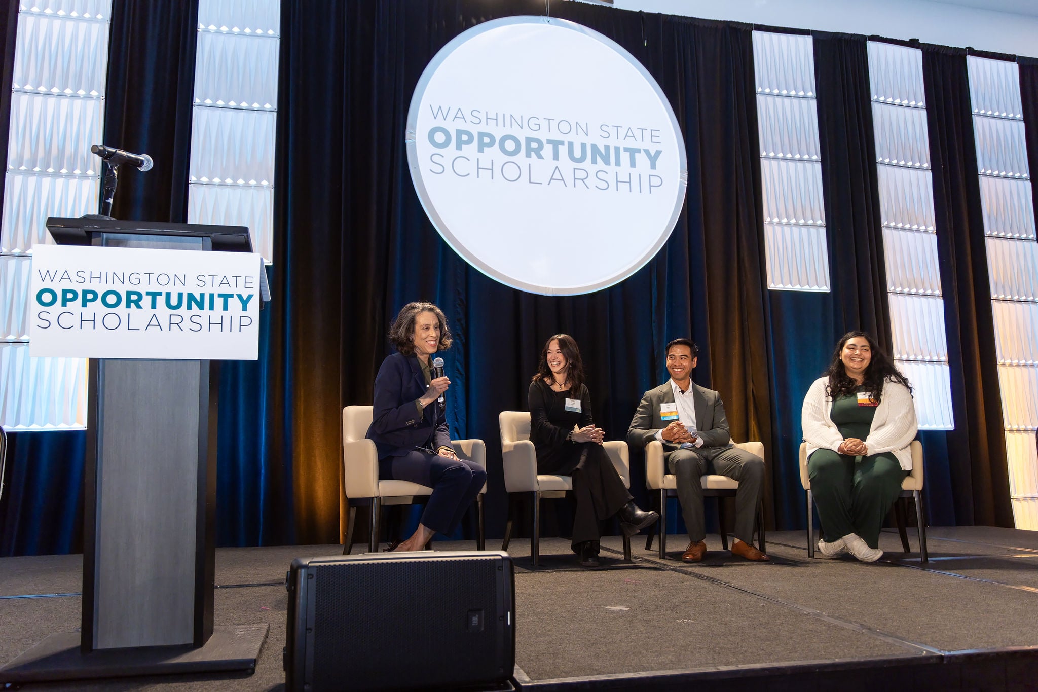 Opportunity Scholars on stage during the fireside chat at OpportunityTalks 2026